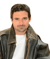 Italian male in his 30s, outdoor setting, light background, friendly smile
